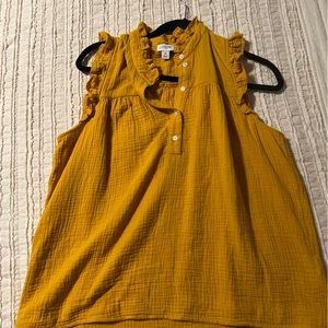Never worn J Crew ruffle blouse. Beautiful deep yellow. Perfect for fall!